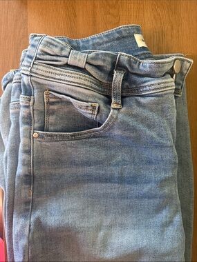 High-Rise Light Blue Women's Jeans with cute bow detail on the waistband